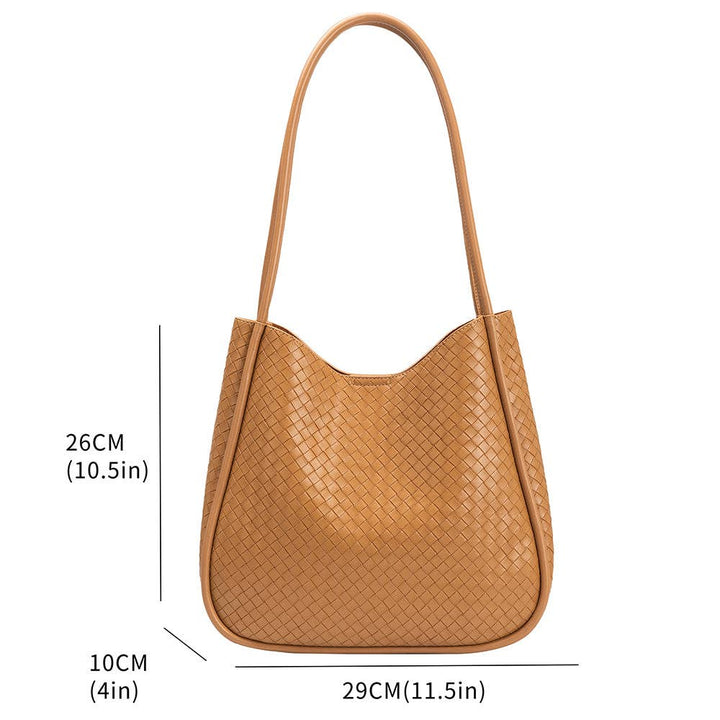 Melie Bianco Mischa Medium shoulder bag made from recycled vegan material in tan