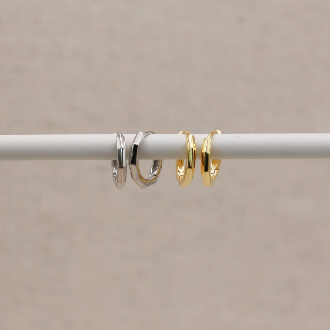 Huggie hoops with gold-colored beveled edges