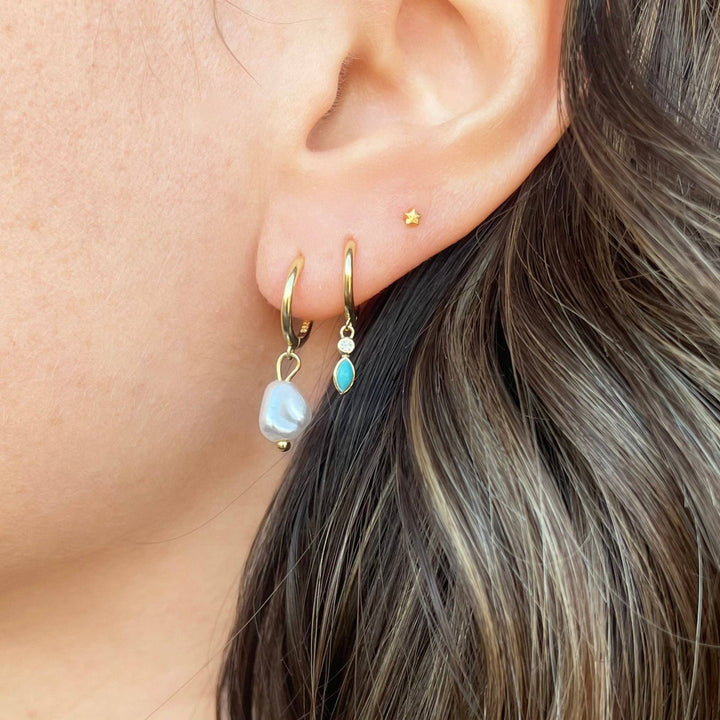 Eva Huggie Hoops in gold with turquoise