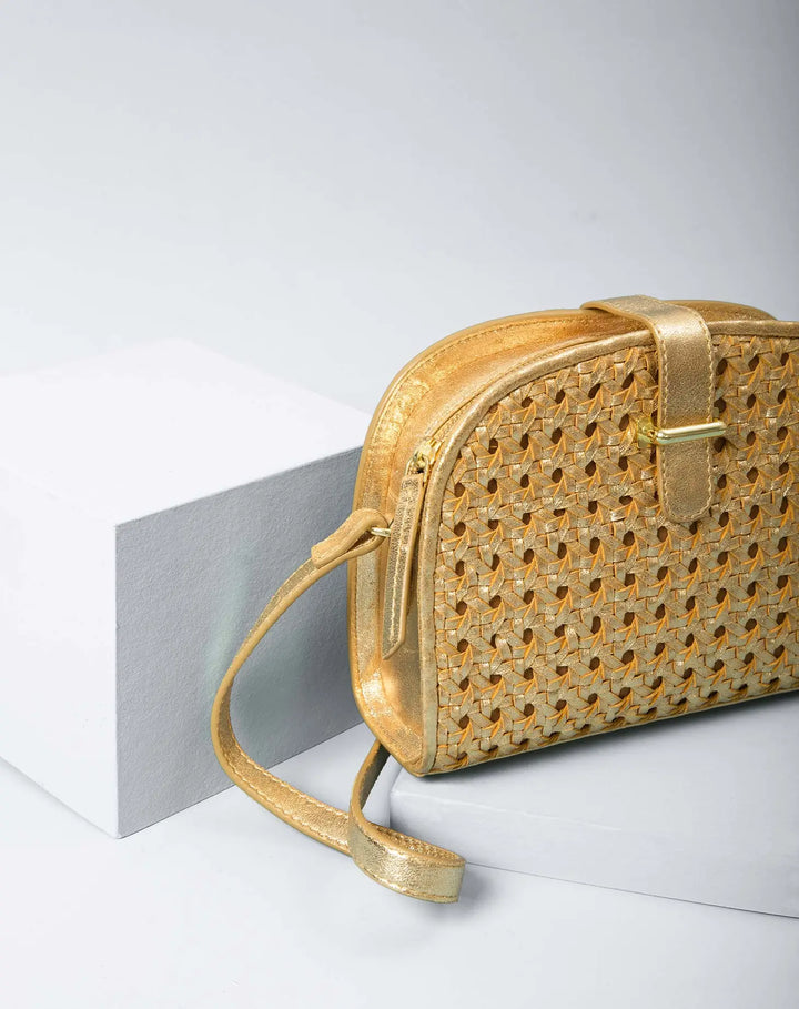 LÉO Gold braided leather handbag